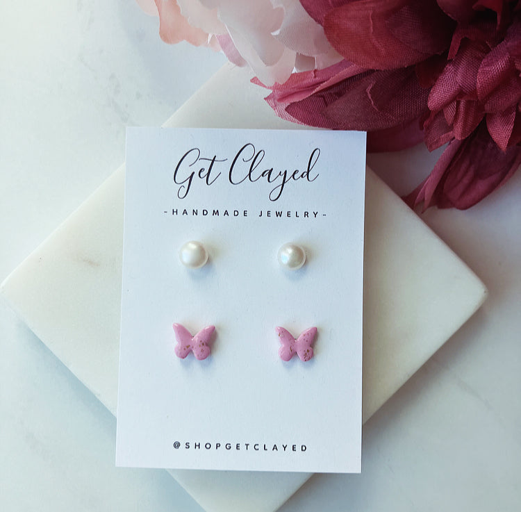Pearl/butterfly stud duo