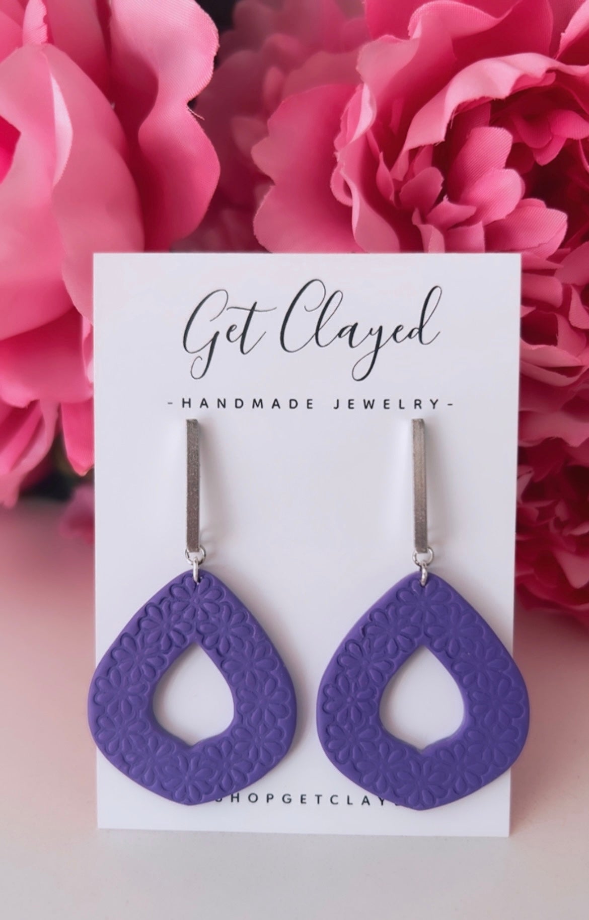 Daisy pattern earrings