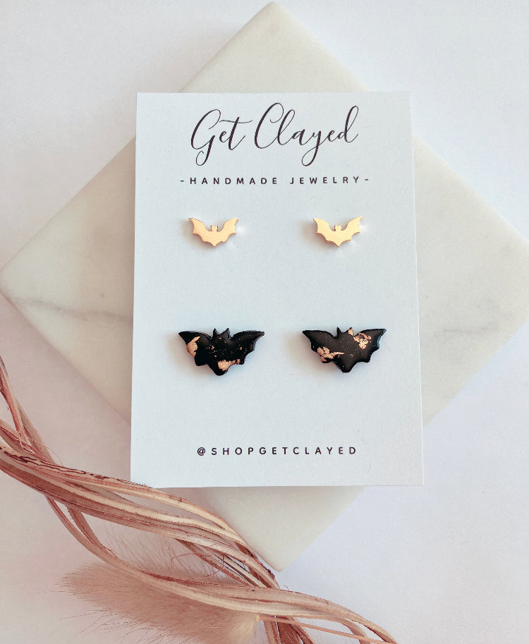 Gold & black bat duo