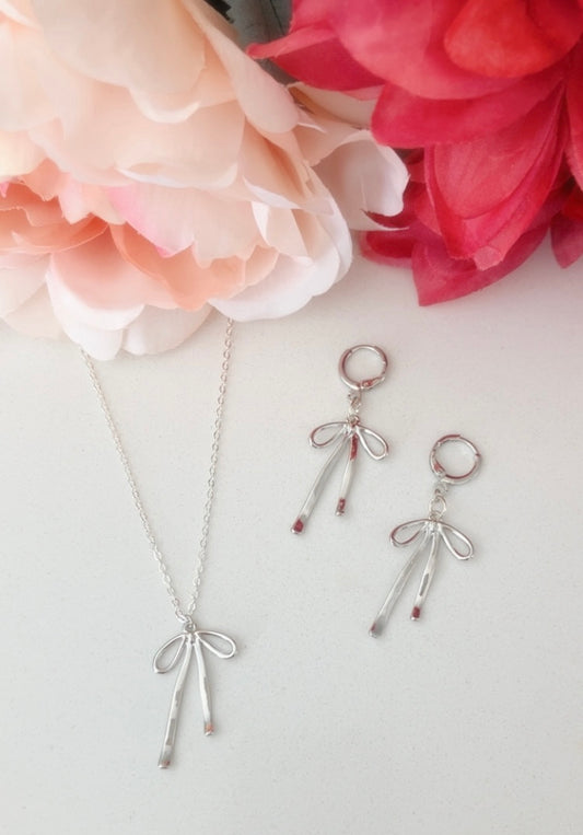 Bow earrings + necklace (sold separately)