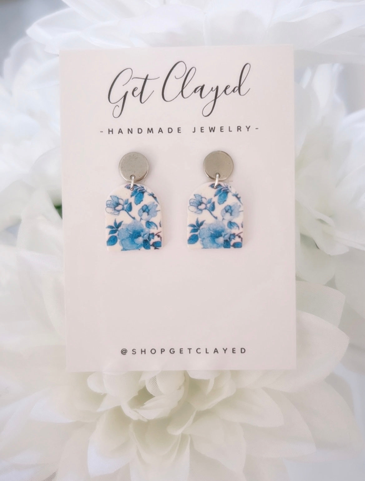 Blue floral design earrings