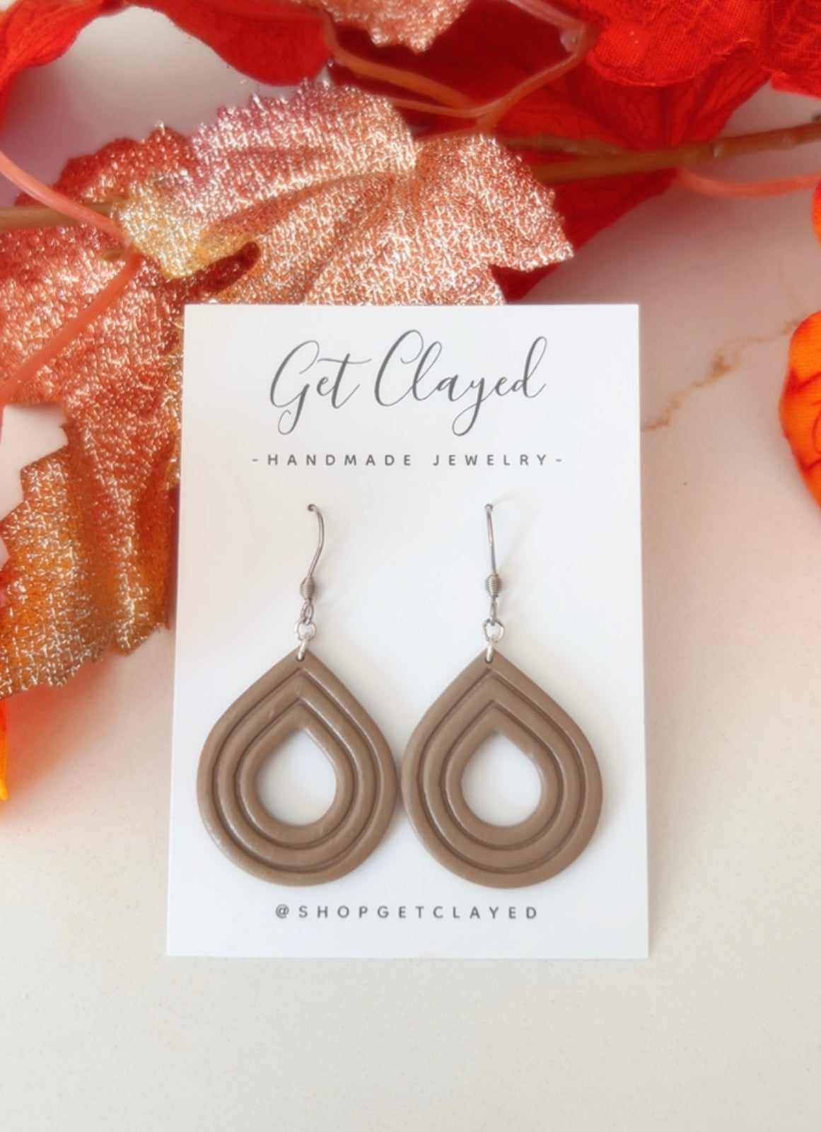 Simple embossed dangle