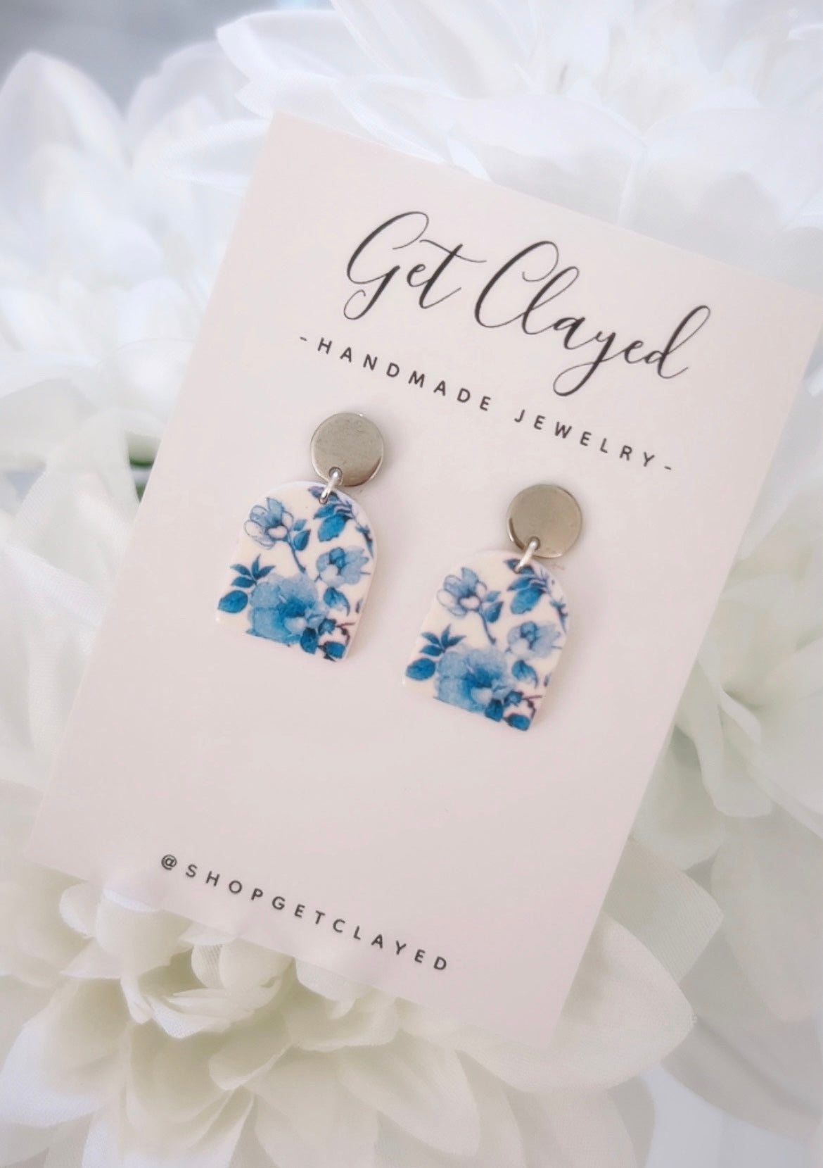Blue floral design earrings