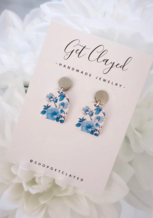 Blue floral design earrings