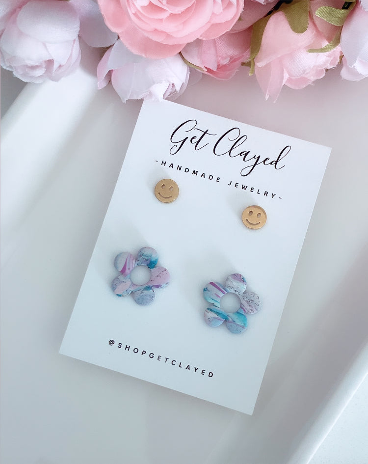 Smiley face flower stud duo