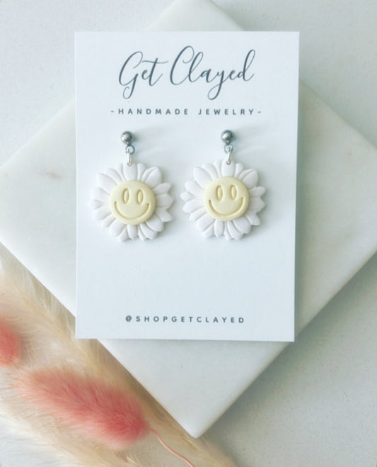 Smiley face daisies